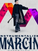 Concert poster - photo of Marcin Patrzałek, behind him colourful letter "M". Title of the concert at the bottom of the page