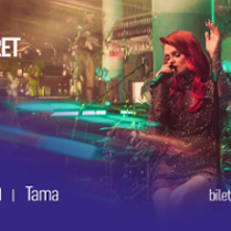 Photo of Margaret singing to a microphone.