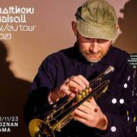 Photo of Matthew Halsall with a trumpet.