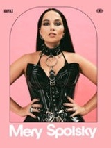 Photo of Mery Spolsky, pink background.