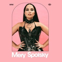 Photo of Mery Spolsky, pink background.