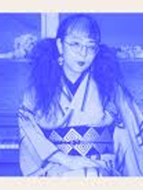 BLue and white photo of Miki Yamanaka.