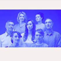 Photo of the band in blue colours.