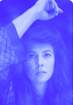 Photo of Monika Borzym in blue colours.