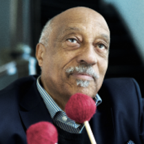 Photo of Mulatu Astatke and information about the event.