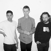 Black and white photo of performers.