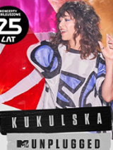 Concert poster with photo of Natalia Kukulska and information about the event.