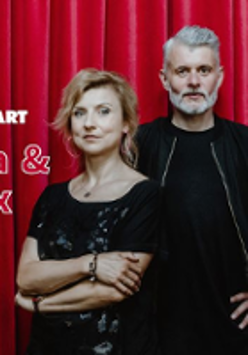 Concert poster with performrs' photo.