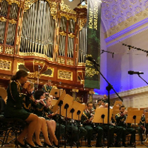 Picture of the Orchestra performing on stage of AMU Auditorium