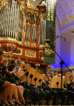 Picture of the Orchestra performing on stage of AMU Auditorium