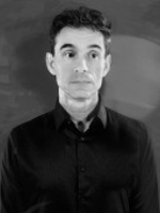 Black and white photo of the artist