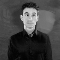 Black and white photo of the artist