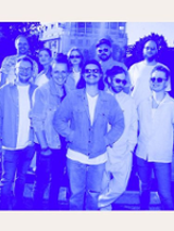 Photo of the band in blue colours.