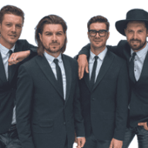 Photo of the band - four men in suits.