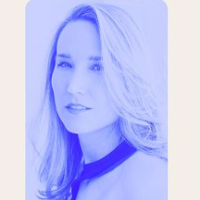Photo of the singer in blue colours.