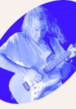Photo in blue colours of Scott Henderson playing the guitar.