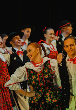 Photo of the performers in folk costumes.