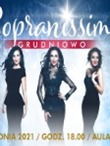 Conert poster: picture of three singers in black dresses and information about the event.