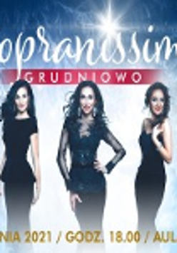 Conert poster: picture of three singers in black dresses and information about the event.
