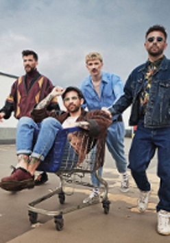 Photo of the band - four young man, one of them is sitting in a shopping trolley.