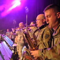 Photo of soldiers - musicians playing their instruments.