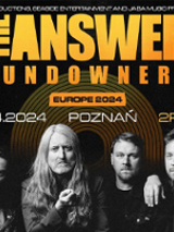 Concert poster: black and white photo of the band and orange text - information about the event.