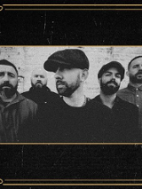 Black and white photo of The Rumjacks band.