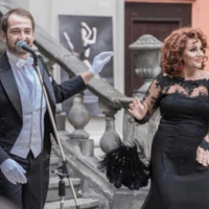 Photo of a man and a woman - two performing singers.