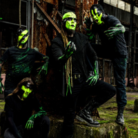 Photo of Transgresja band: four men with green faces.