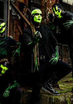 Photo of Transgresja band: four men with green faces.