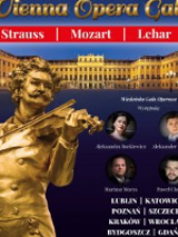 Concert poster with golden monument of a man playing the violin.