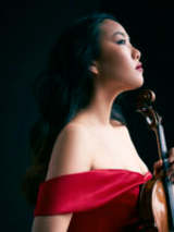 Photo of the artist - Stella Chen holding a violin in her hand
