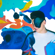 Colourful picture of the artist; as a background colourful spots.