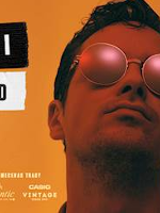 Concert poster: photo of Krzysztof Zalewski in sunglasses on orange background