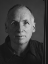 Black and white photo of the artist