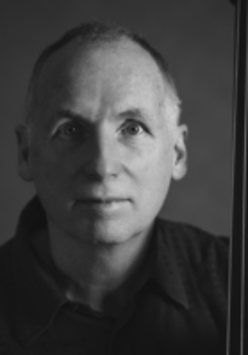 Black and white photo of the artist