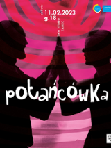 Photo of two people in profile standing opposite each other and touching with their hands.