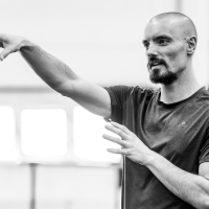 Black and white photo of Maciej Kuźmiński