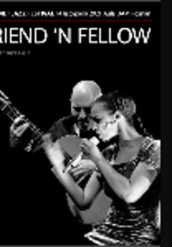 Black and white picture of the duo - a singing woman and a man playing the guitar