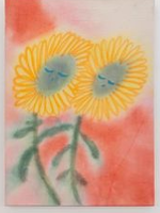 Picture of two yellow flowers with faces