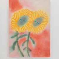 Picture of two yellow flowers with faces