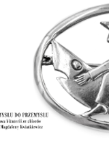 Exhibition poster with a piece of silver jewellery.