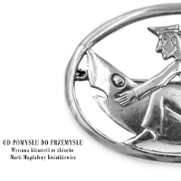 Exhibition poster with a piece of silver jewellery.