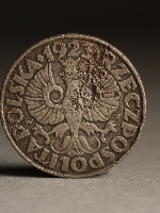 Photo from the exhibition: an old coin.