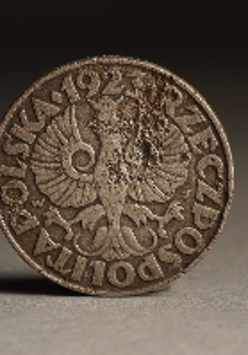 Photo from the exhibition: an old coin.