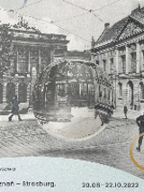 Exhibition poster - black and white photo of buildings from the turn of XIX i XX centuries and information about the event.