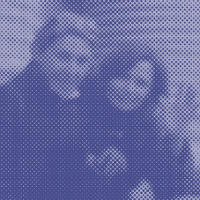 Photo of two persons in violet colours.