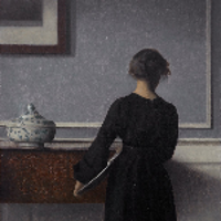 One of the artist's works: picture of a woman in black clothes standing back to the viewer.