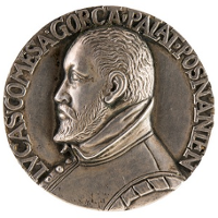 One of the exhibits: a silver medal with man's face in profile.