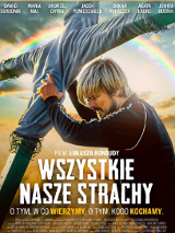 Film poster: a man shoring up a cross, which is partly covered with a cloth. A rainbow in a background.